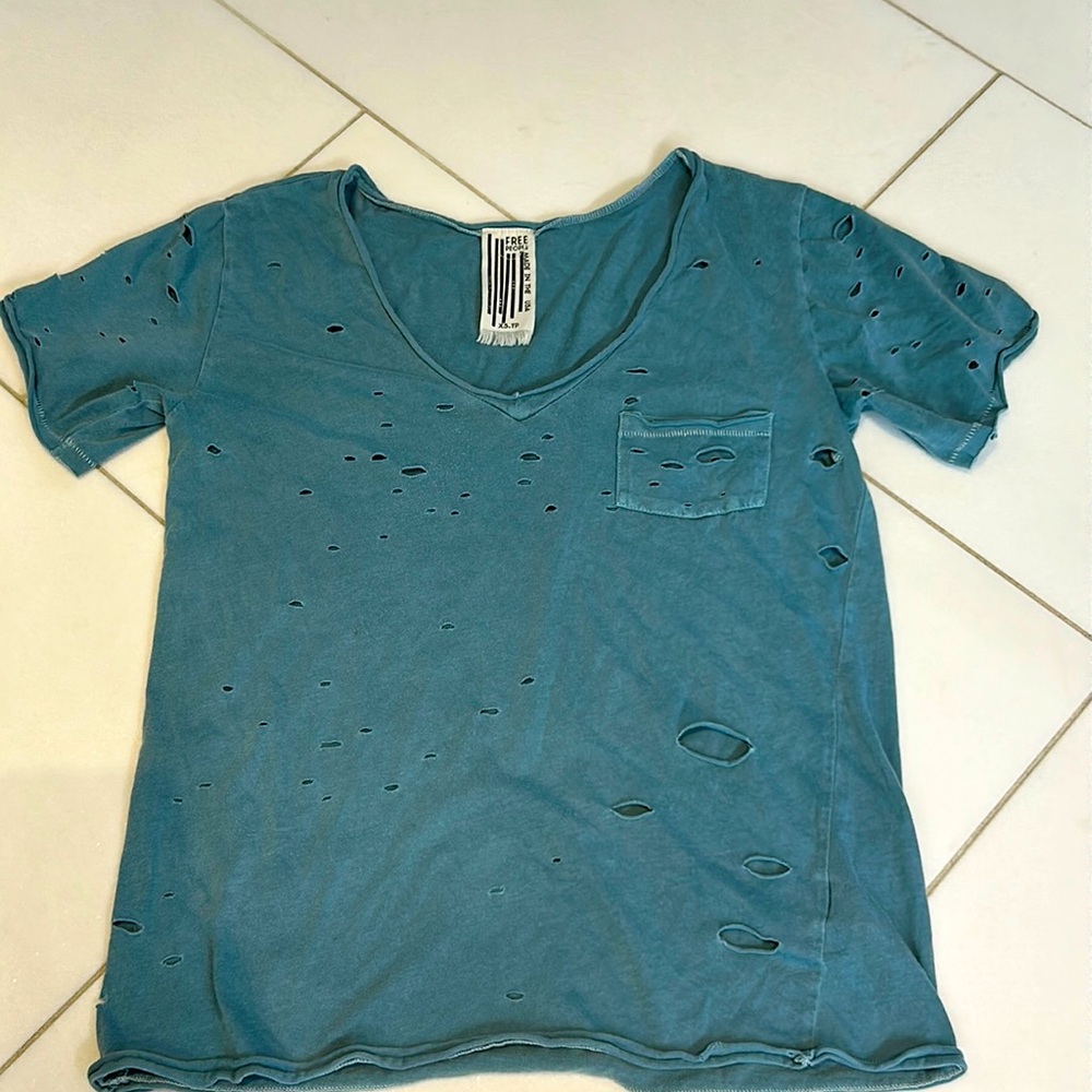 We the free distressed V-neck T-shirt